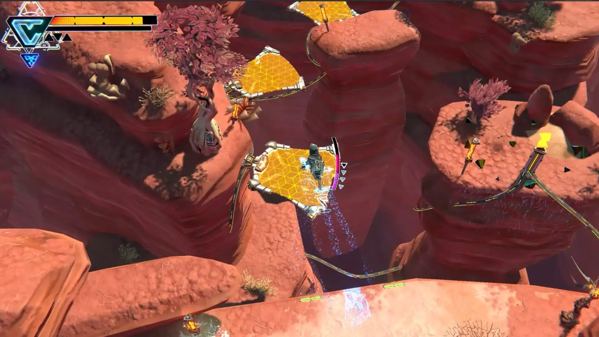 A hooded character crosses glowing yellow platforms suspended above a red-rock canyon.
